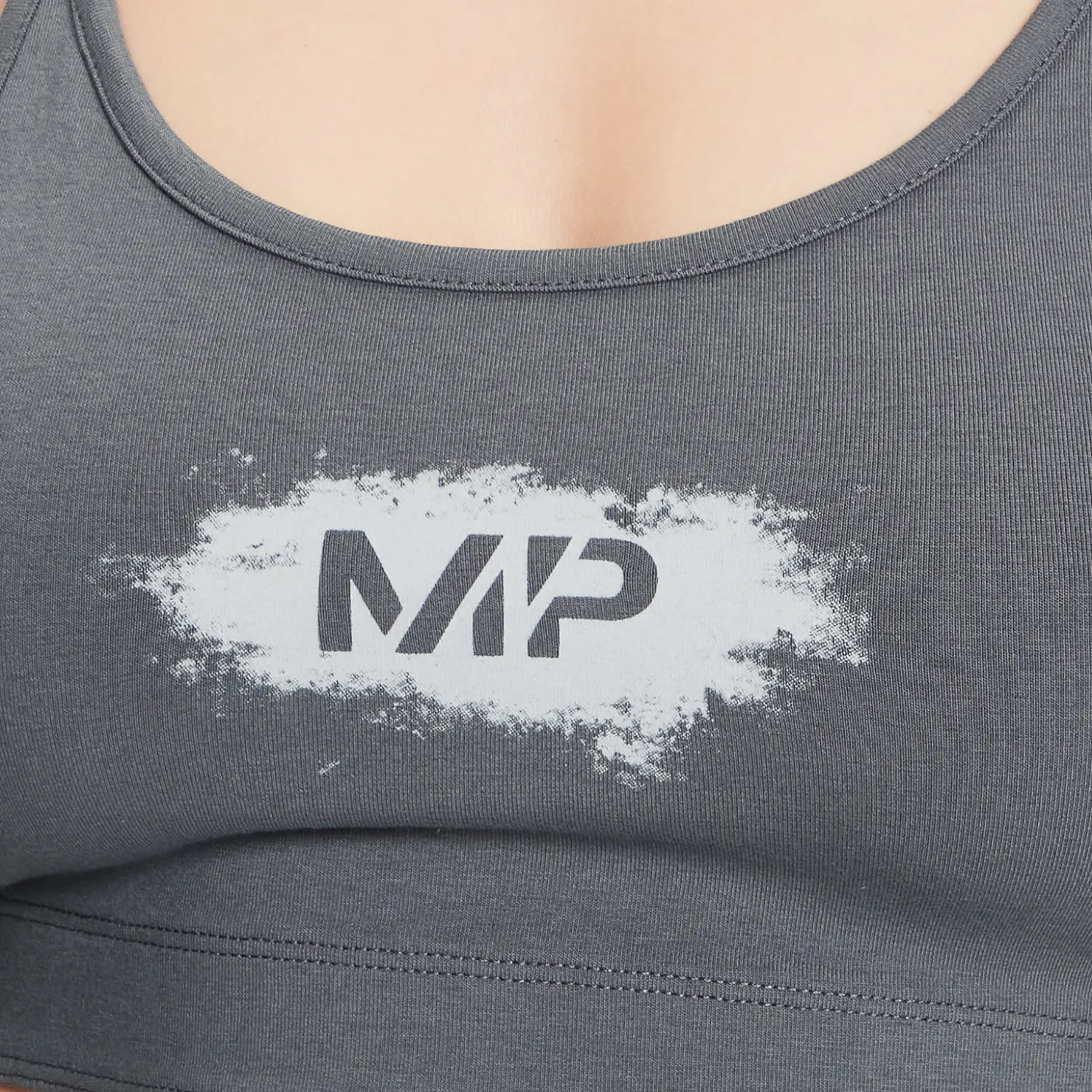 MYPROTEIN MP Damen kreidefarbene Grafik Sport-BH — Carbon*Damen Sports Bras